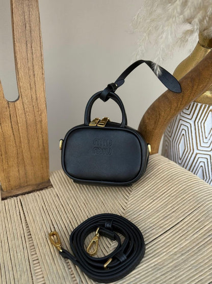 Miu Miu Sling bag